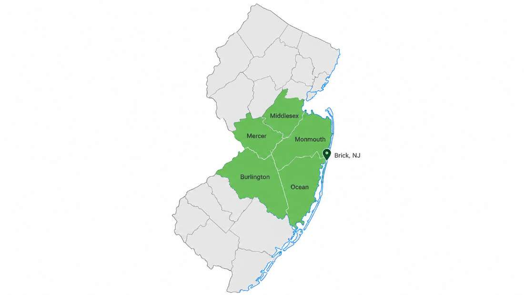 Map of New Jersey with Ocean, Monmouth, Middlesex, Mercer, and Burlington Counties highlighted in green around AmeriTel’s Brick office